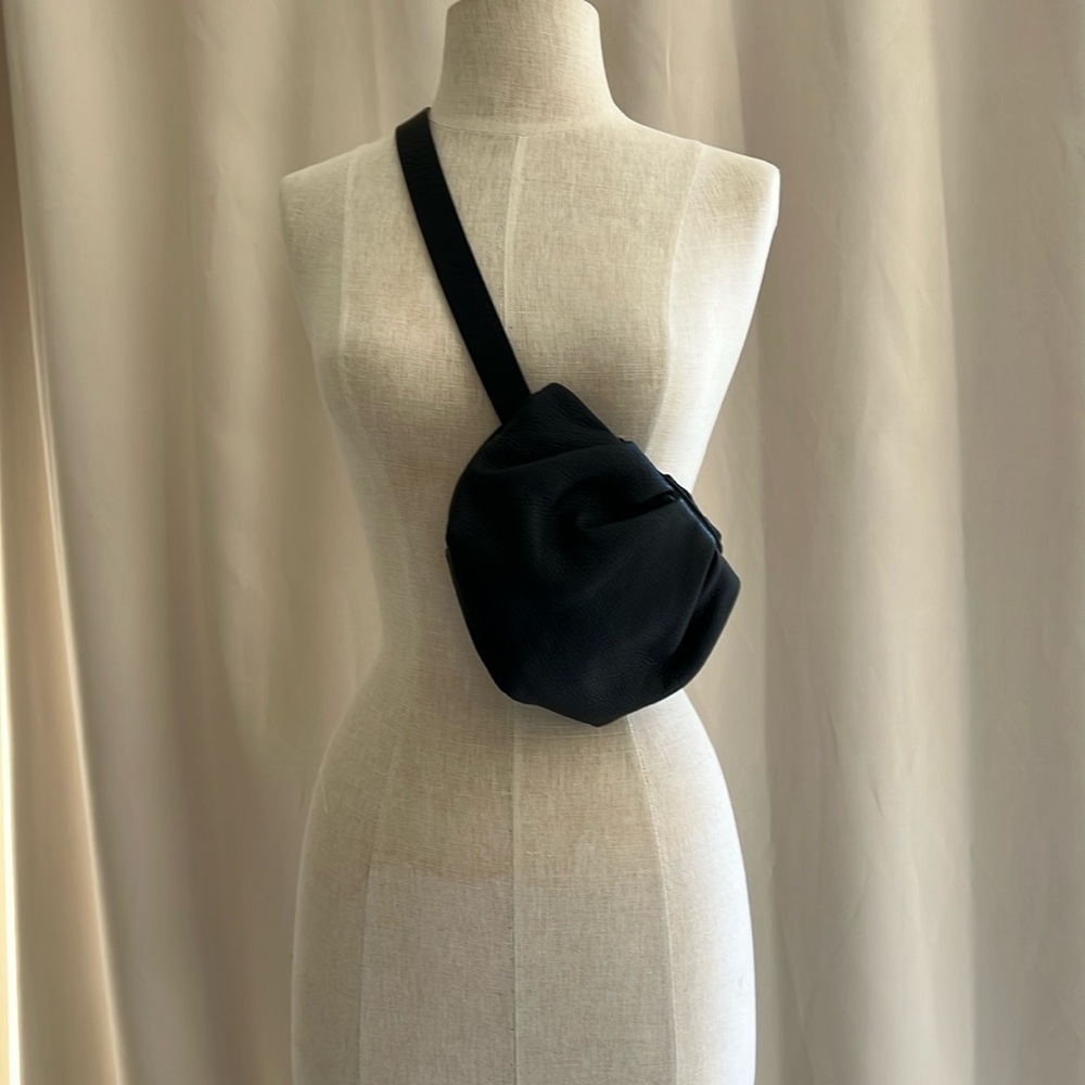 Black Puffy Crossbody Bag with Modern Silhouette